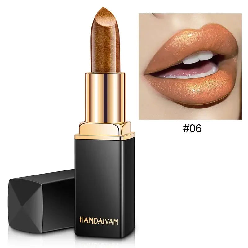 Gold-toned metallic lipstick in a black and gold tube.