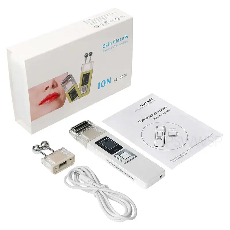 Skin care device kit with a handheld electronic unit, accessories, and packaging.