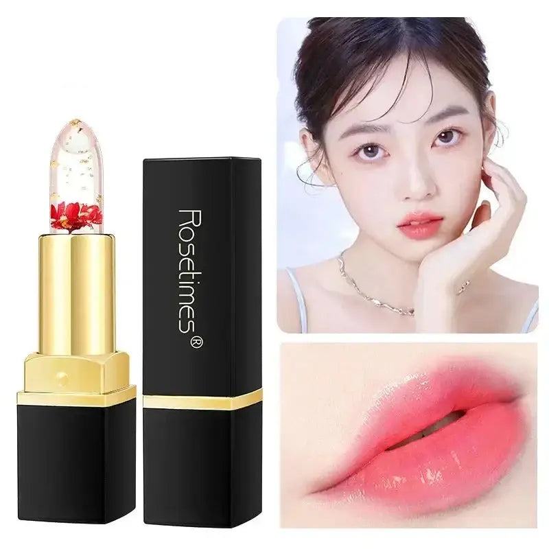 Gold and black lipstick tube with red floral design visible in the lipstick itself.