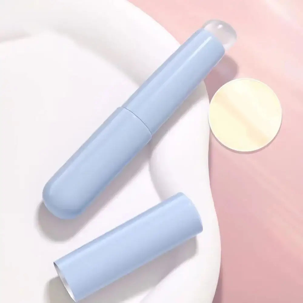 Light blue plastic tampon applicator with two parts.