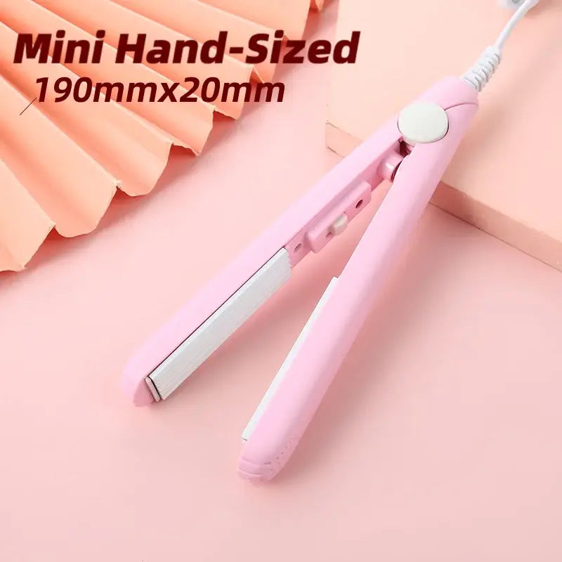 Pink mini hair straightener with a compact design.