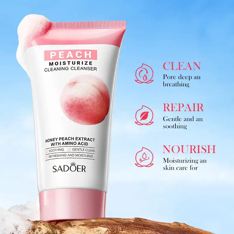 Peach-colored facial cleanser tube with moisturizing properties.