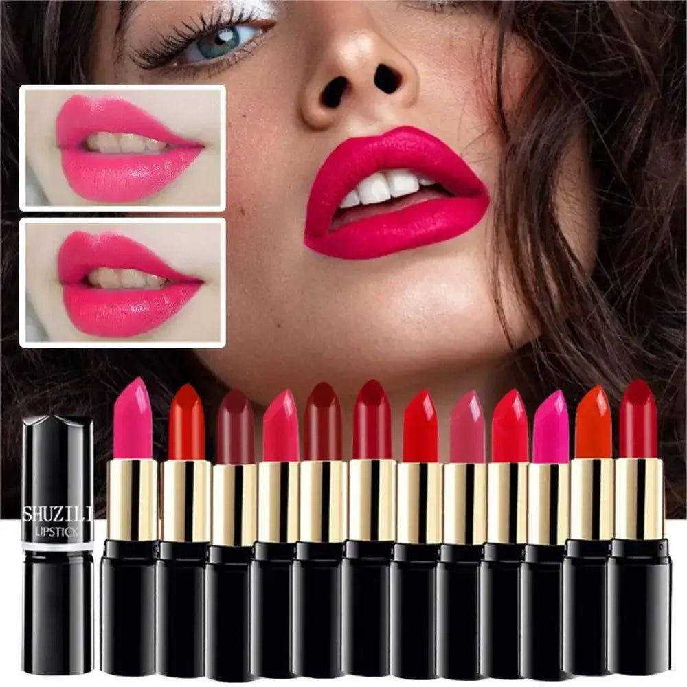 Collection of vibrant lipsticks in various shades of pink and red.