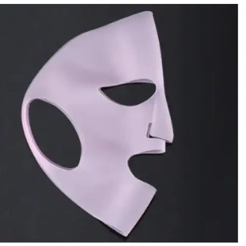 White theatrical half-mask with stylized features.