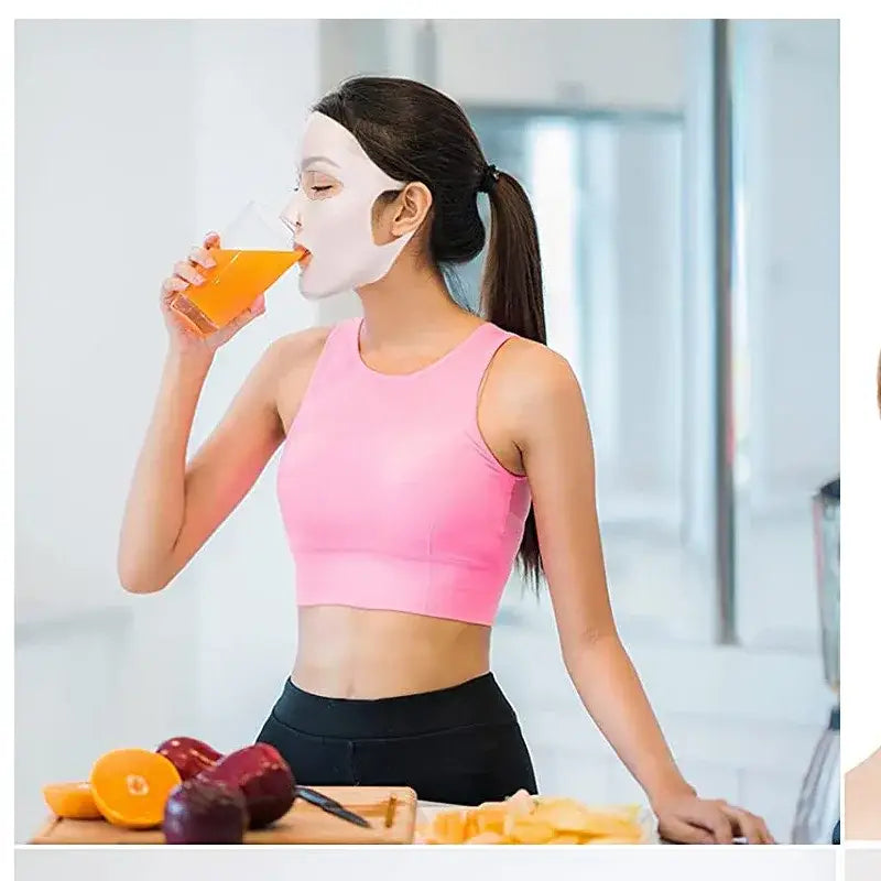 Woman in athletic wear drinking orange juice while wearing a face mask.