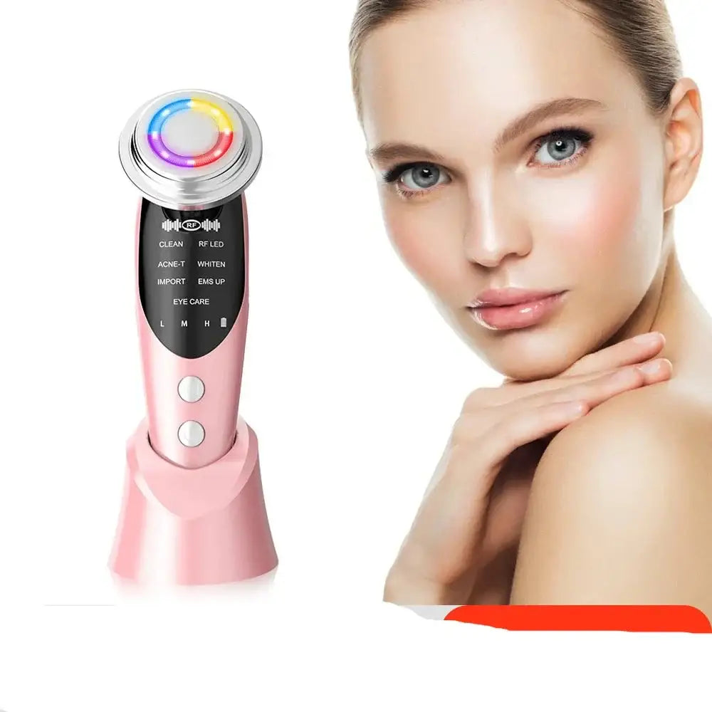 Pink handheld beauty device with a circular head and control panel.