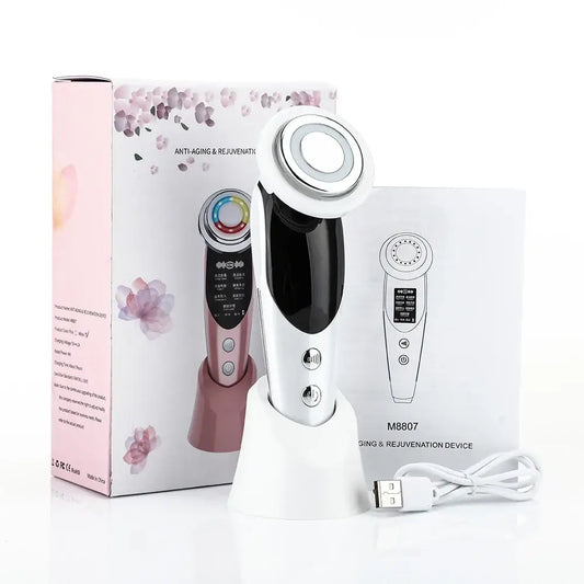 Facial beauty device with multiple attachments for skincare treatments.