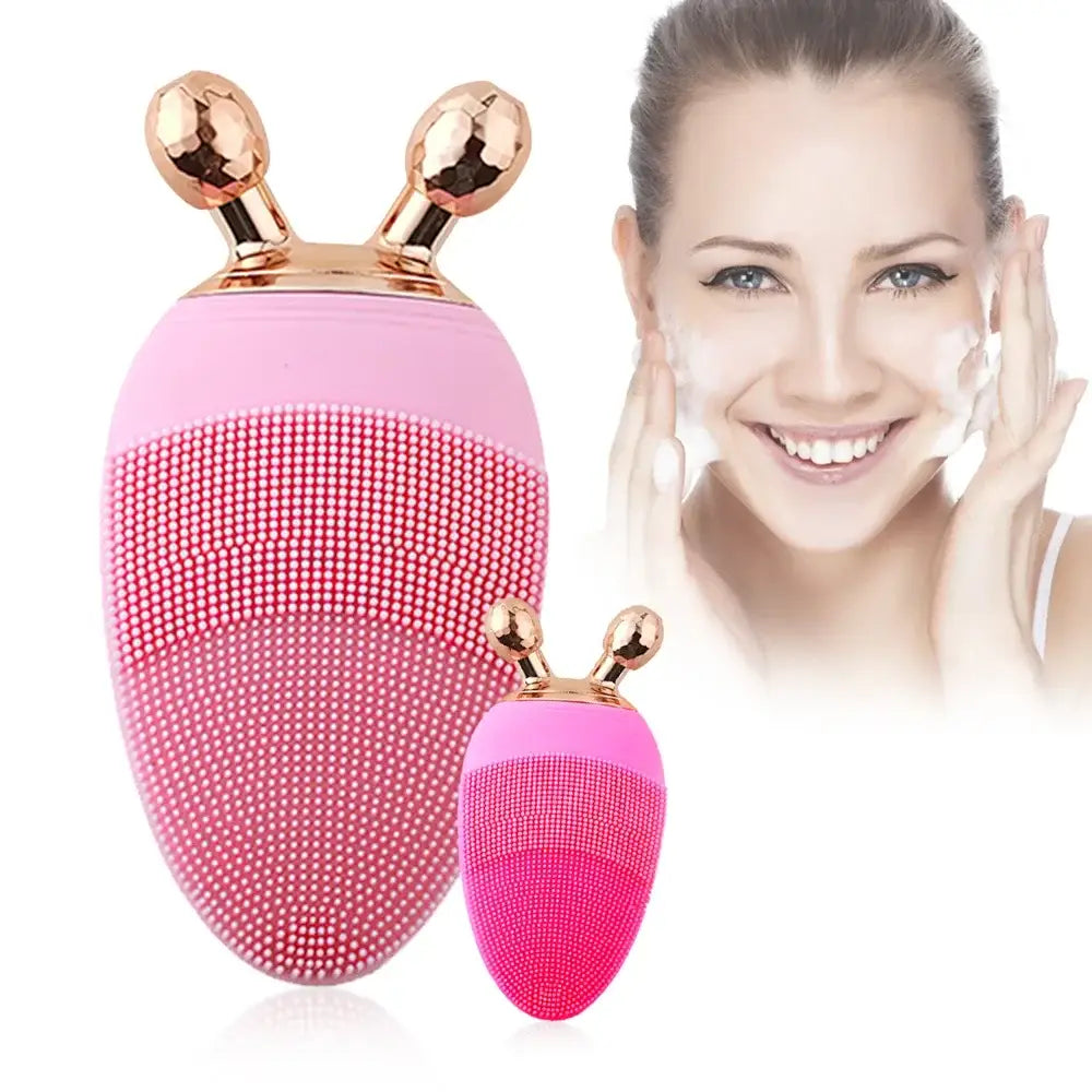 Pink silicone facial cleansing brush with gold-colored antenna-like protrusions.