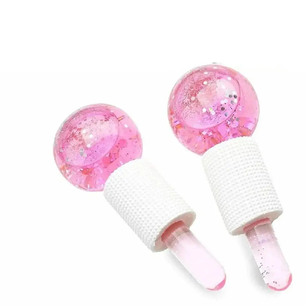 Pink glittery ice cream-shaped popsicles with white handles.