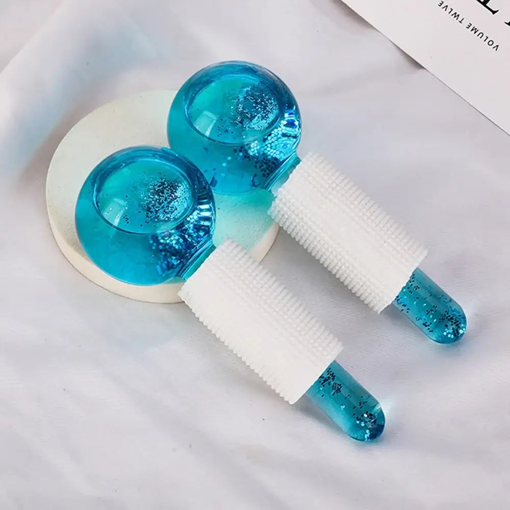 Turquoise blue crystal-like lollipops or popsicles with white handles.