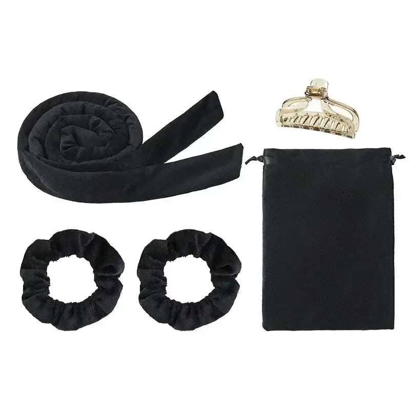 Black silk hair accessories set including a headband, scrunchies, pouch, and decorative hair clip.