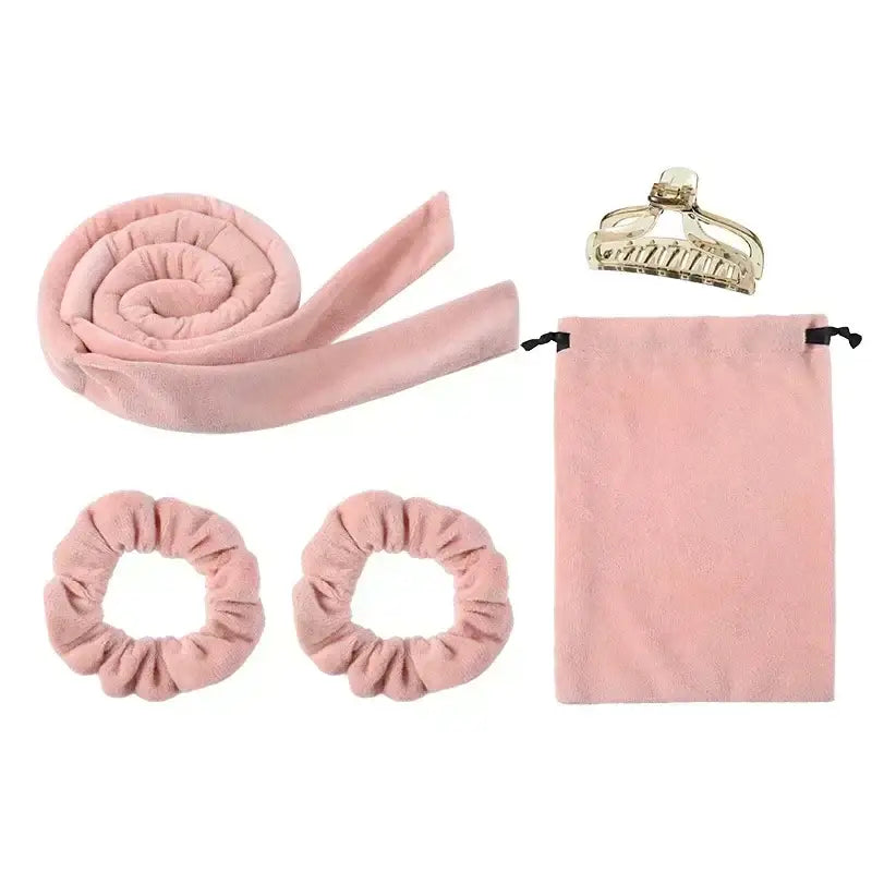 Pink hair care set including a headband, scrunchies, claw clip, and drawstring bag.