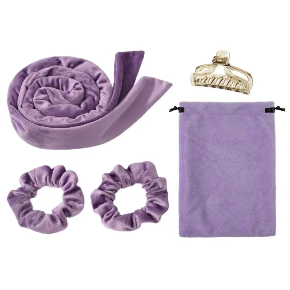 Purple silk or satin hair accessories set including a headband, scrunchies, and storage pouch.