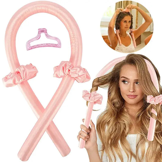 Pink heatless hair curler with foam rollers and a clip attachment.