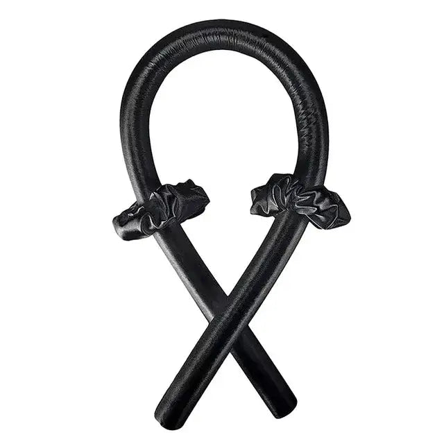 Black leather jump rope with handles shaped like boxing gloves.