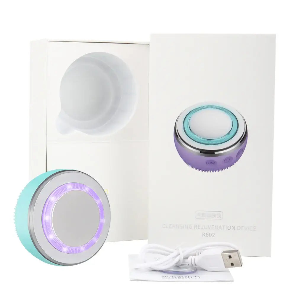 Handheld electronic facial cleansing device with LED lights.