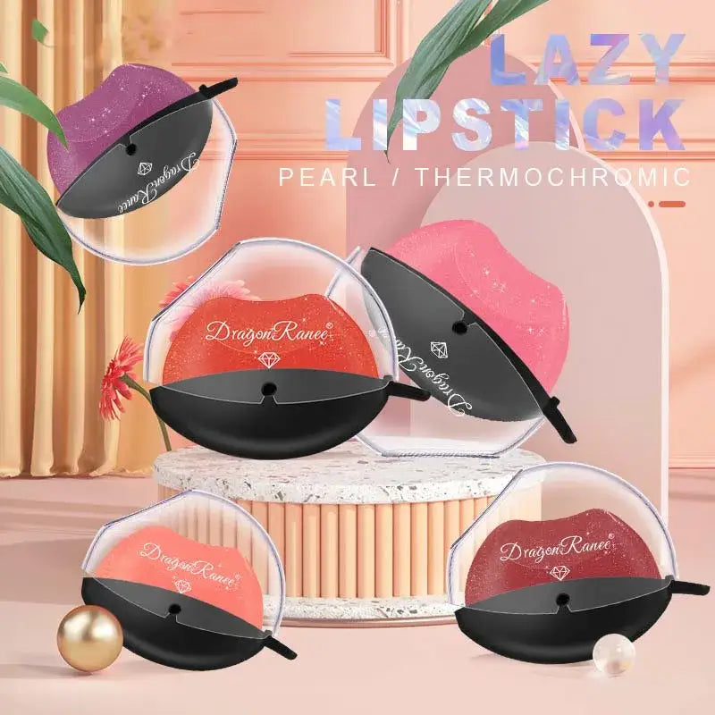 Compact lipsticks with pearl or thermochromic properties in round black cases.