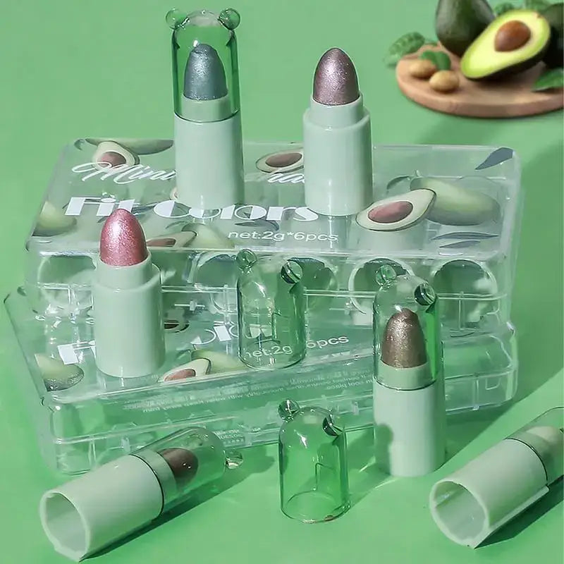 Collection of avocado-themed lipsticks in metallic shades.