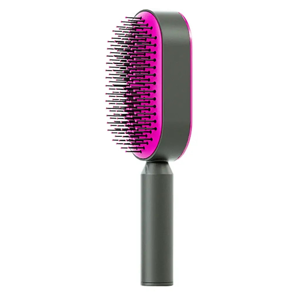 Hair brush with a pink paddle and black bristles on a gray handle.