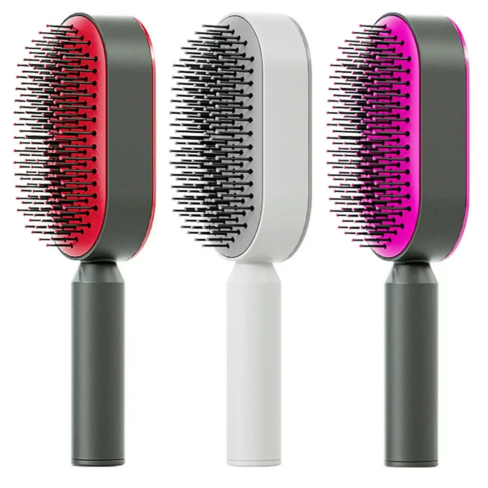 Hair brushes with bristled oval heads and cylindrical handles in red, white, and pink colors.