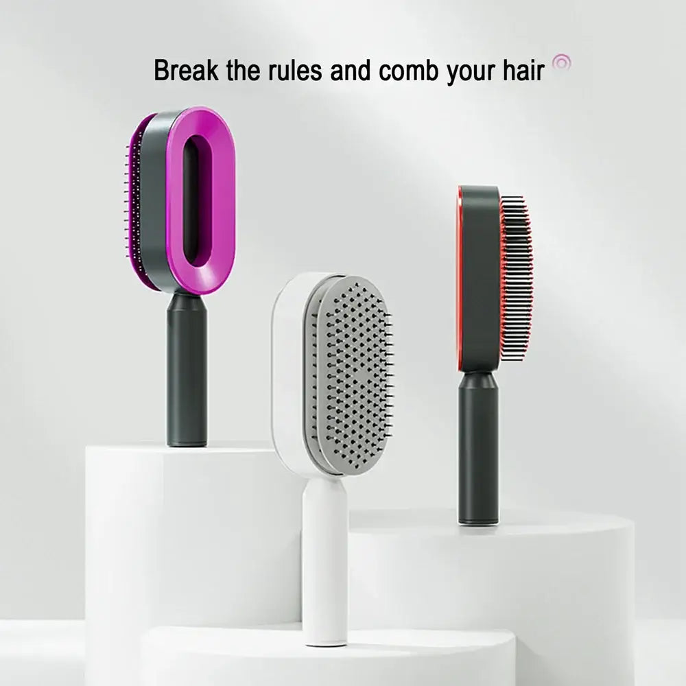 Three different hair brushes or combs displayed on white pedestals.