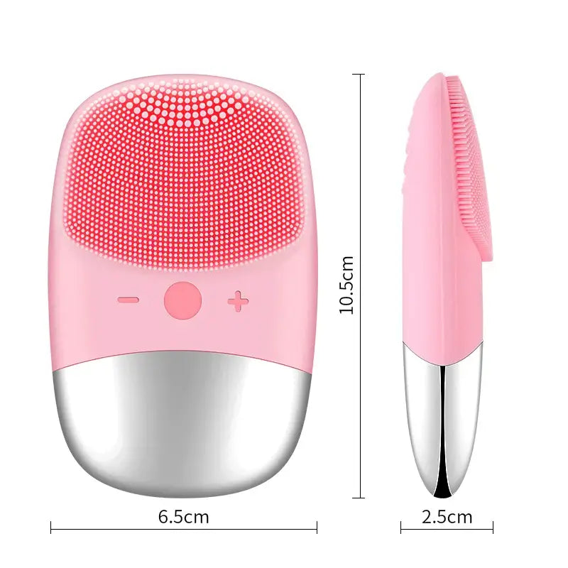 Pink silicone facial cleansing brush with silver base and dimensions shown.