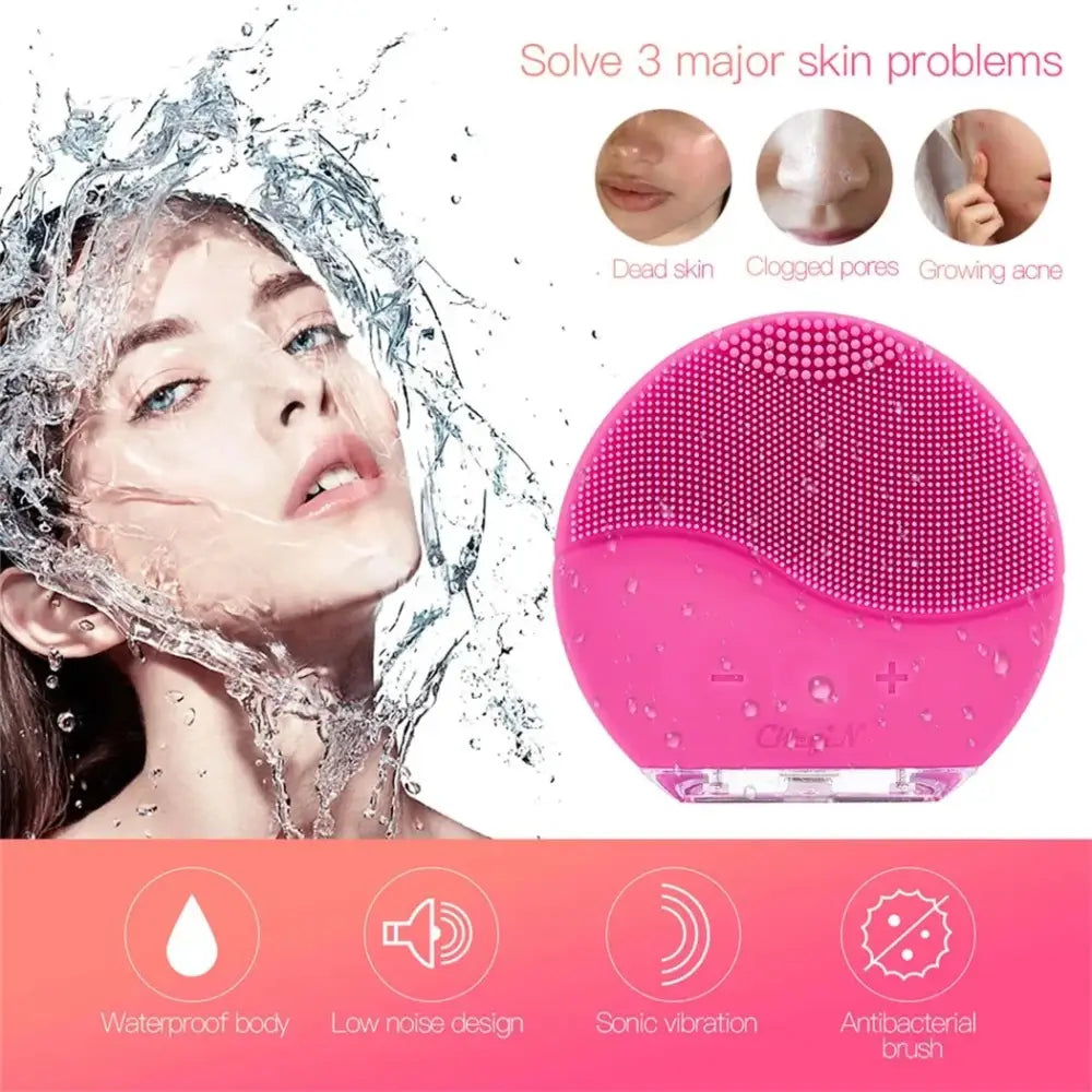 Pink silicone facial cleansing brush with soft bristles.