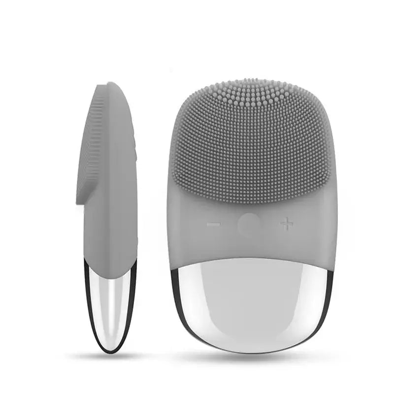 Facial cleansing brush with silicone bristles and oval-shaped handle.