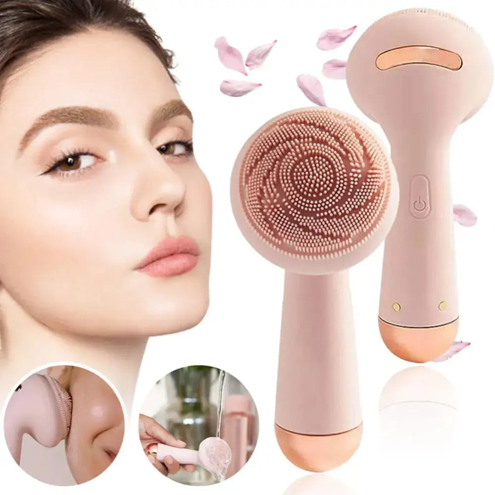 Pink facial cleansing brush with a circular silicone head and ergonomic handle.