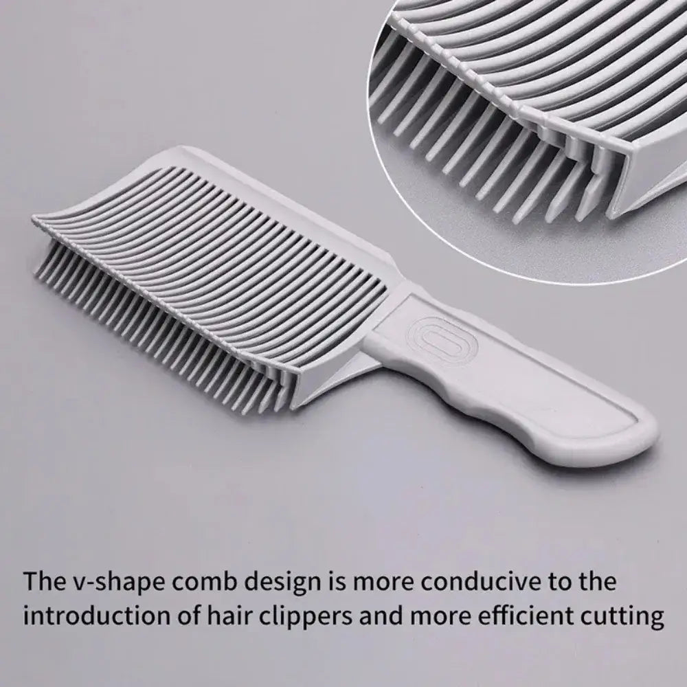 V-shaped comb with a handle designed for efficient hair cutting.