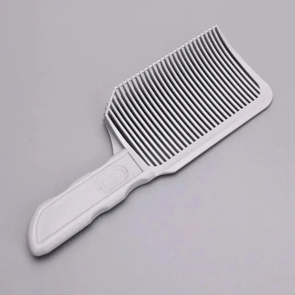 White plastic hair comb with a handle and closely spaced teeth.