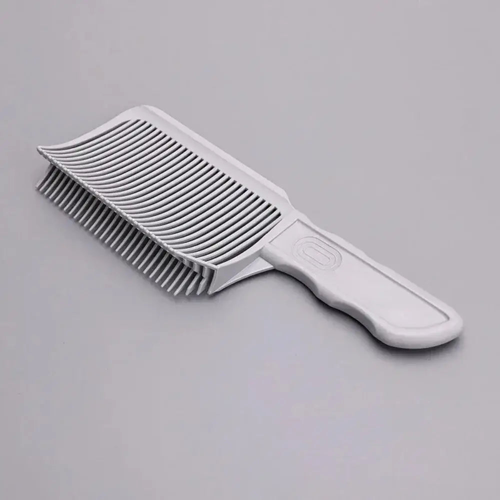 White plastic hair comb with a curved, ridged design and ergonomic handle.