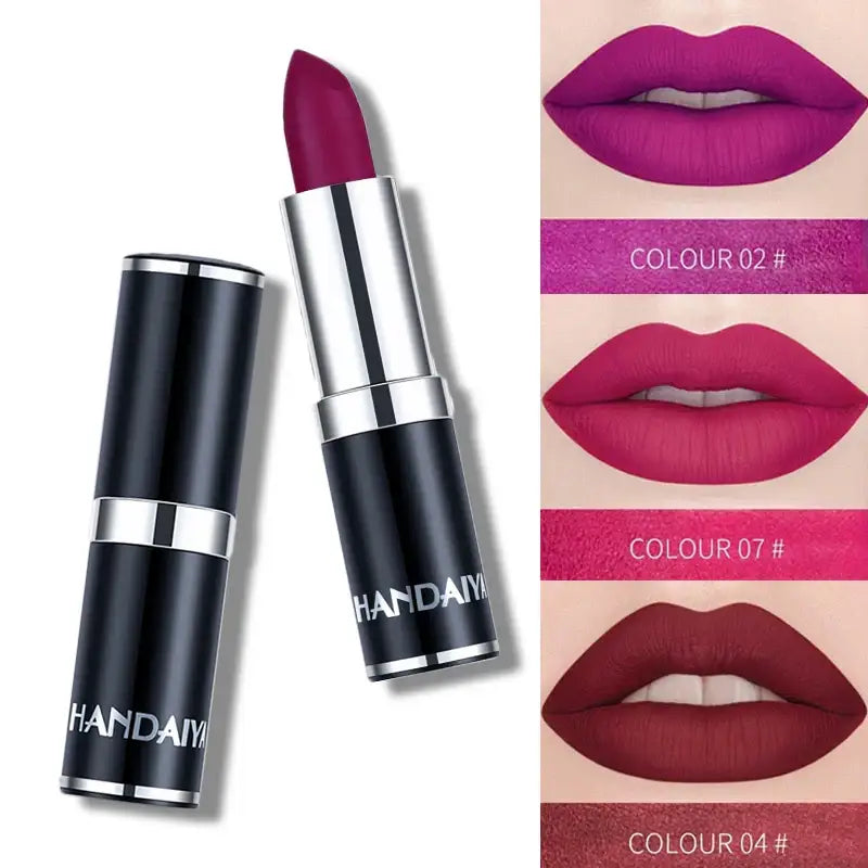 Vibrant purple lipstick in a sleek black tube with silver accents.