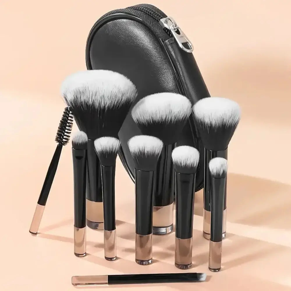 Set of makeup brushes with a black carrying case.