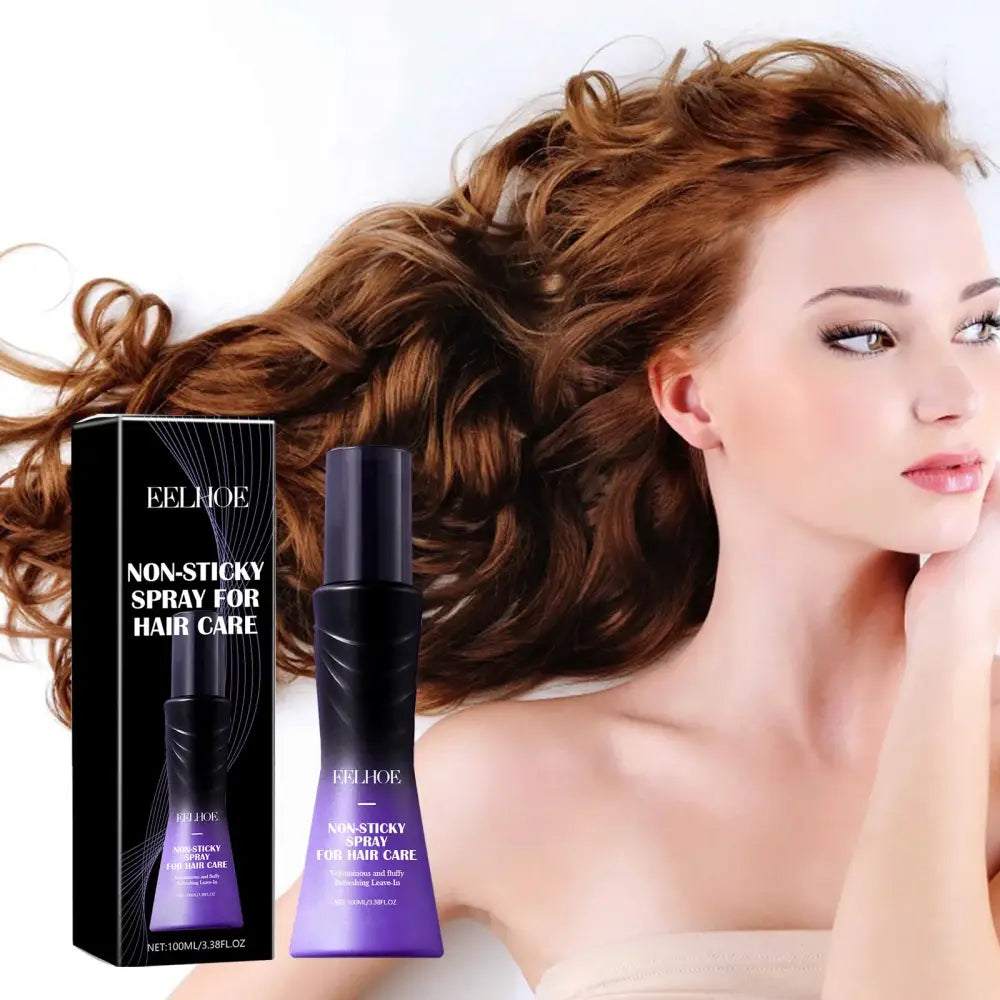 Hair care product bottle with purple gradient design alongside its packaging.