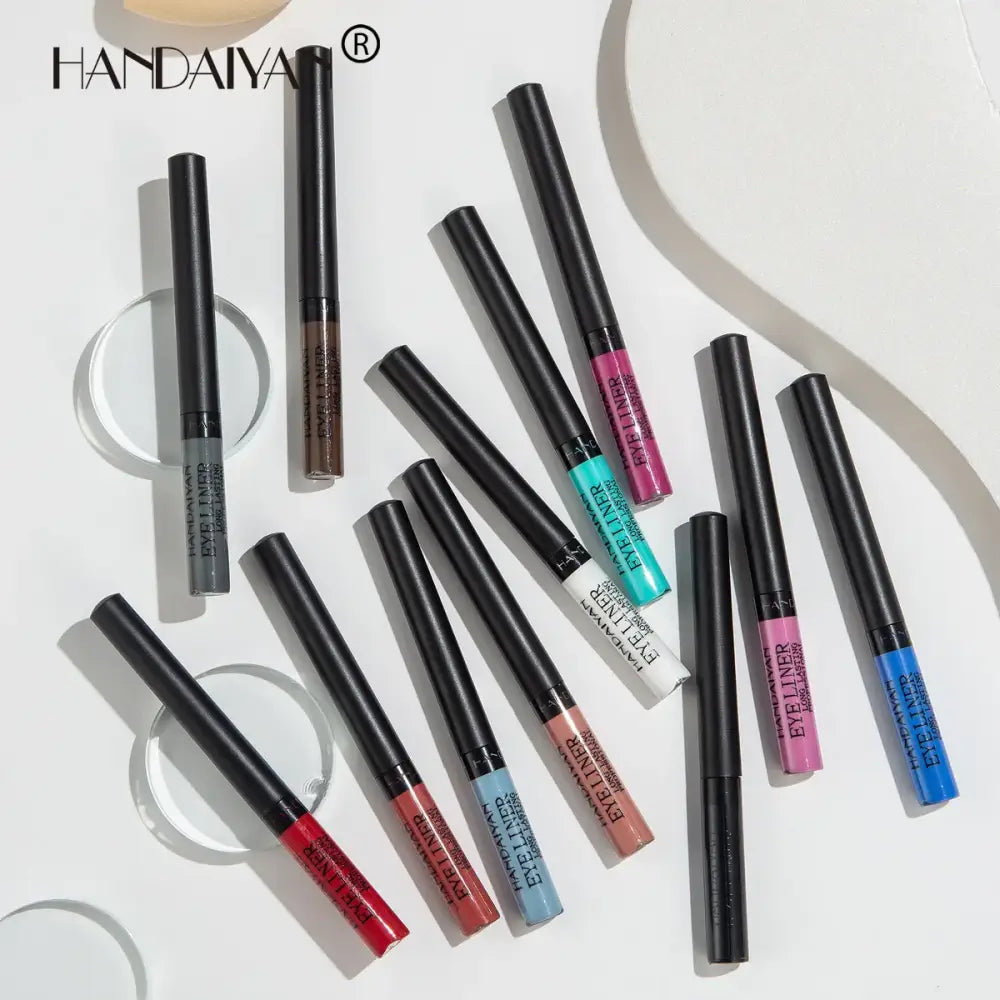 Collection of colorful liquid eyeliners in various shades.