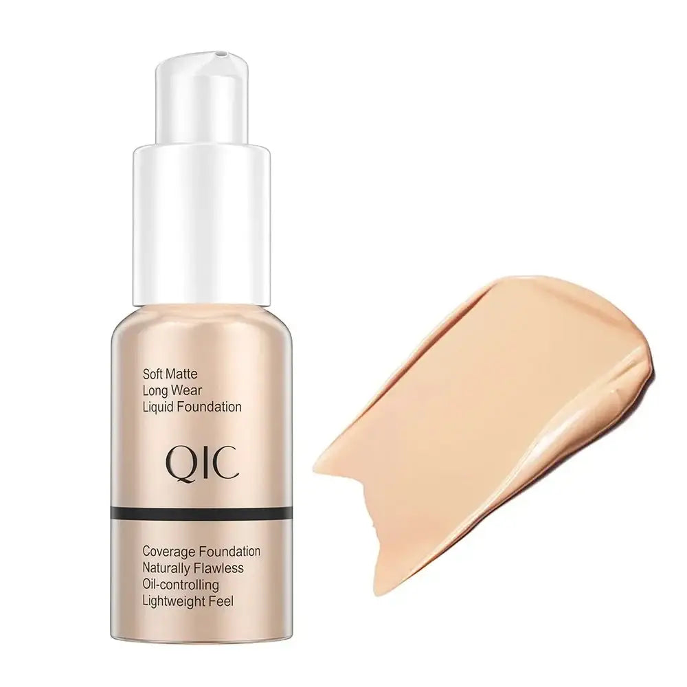 Bottle of QIC brand liquid foundation with a swatch of the product beside it.