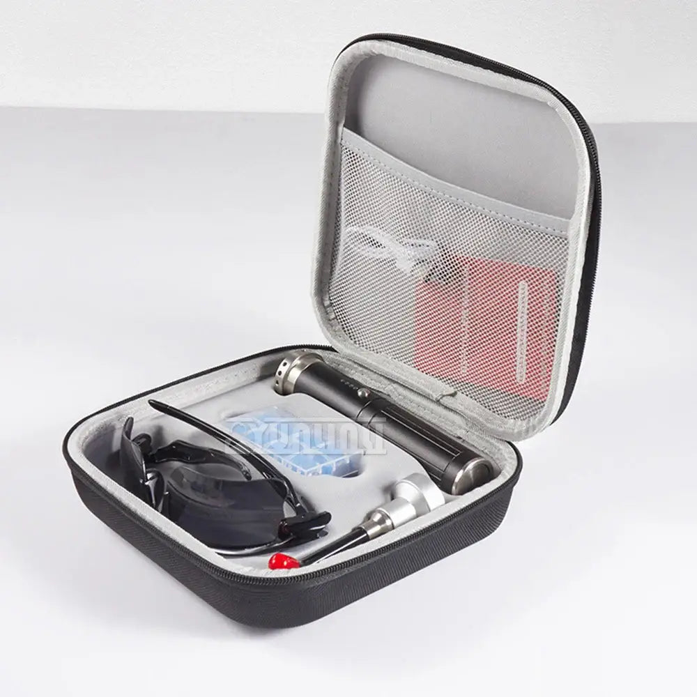 Travel case containing various personal care items and accessories.