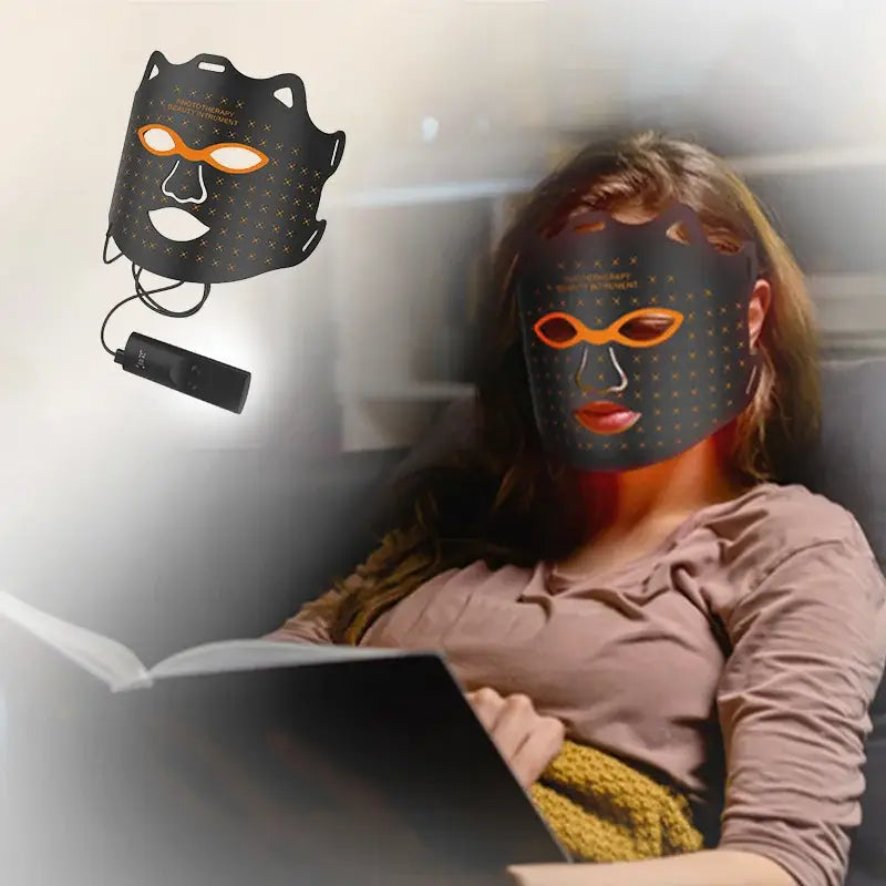 LED light therapy face mask with glowing orange eye areas.