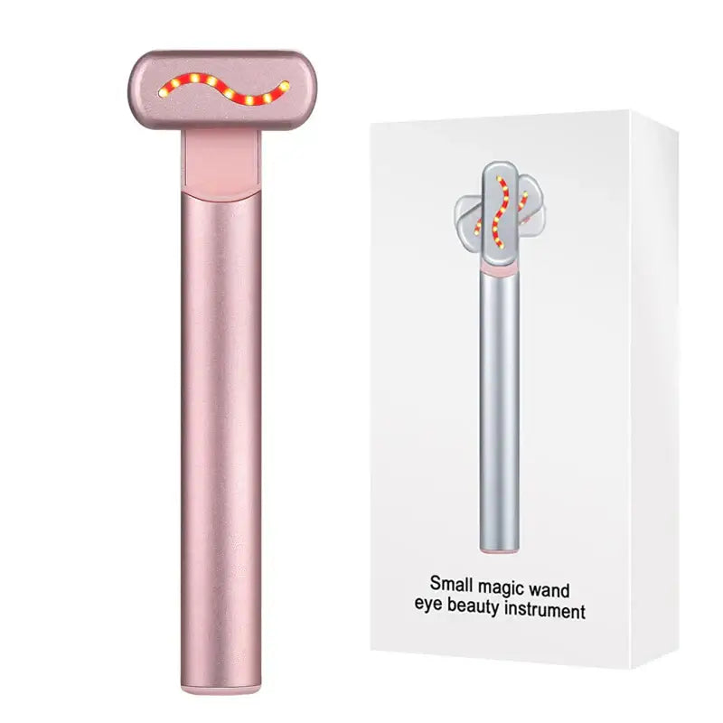 Rose gold handheld beauty device with a pink oval head featuring an orange curved light.