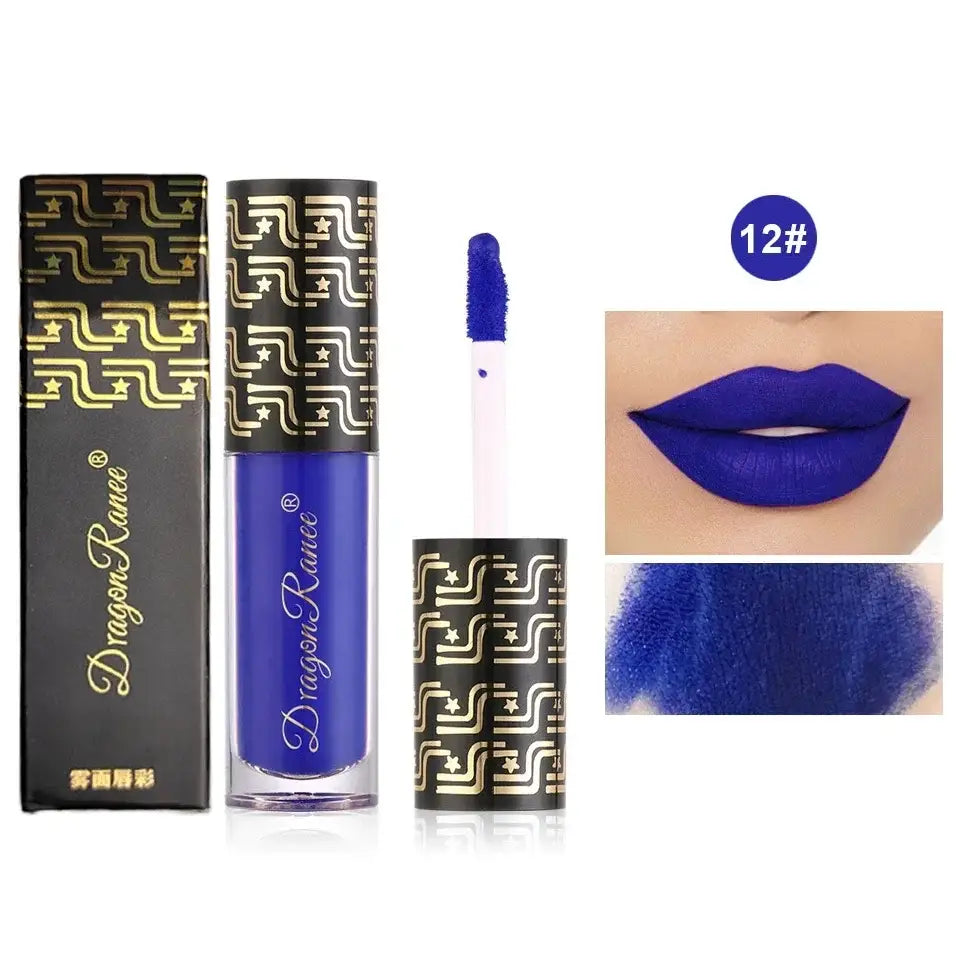 Vibrant blue liquid lipstick with ornate gold-patterned packaging.