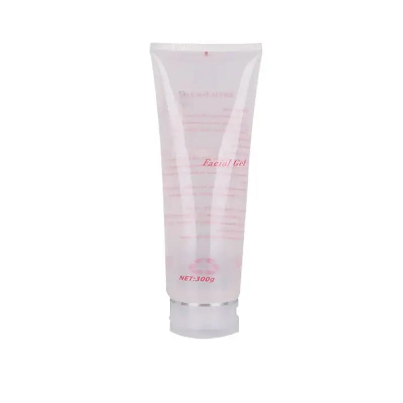 White plastic tube of facial lotion or skincare product with pink text.