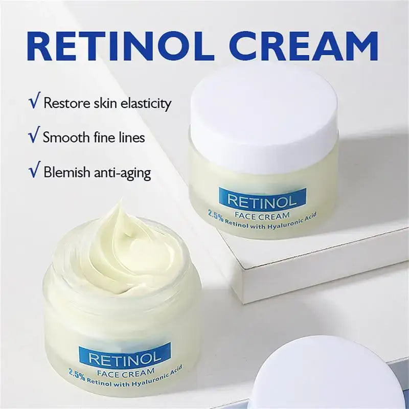 Retinol face cream in a white jar with blue labeling.