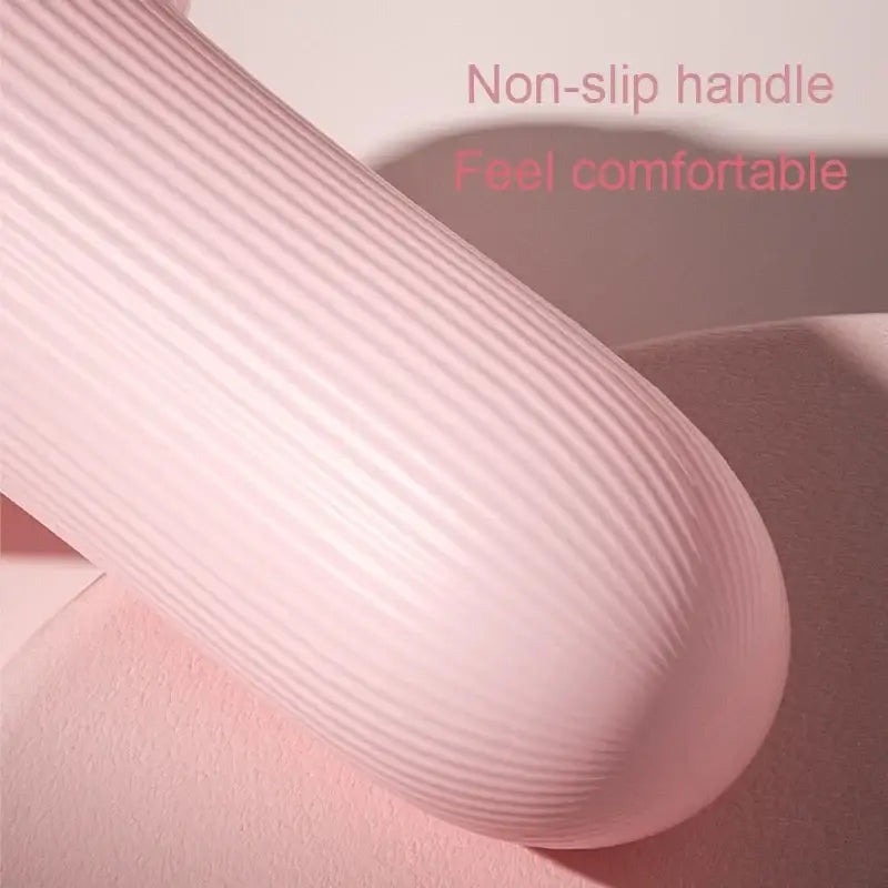 Pale pink textured silicone or rubber handle with ribbed surface.