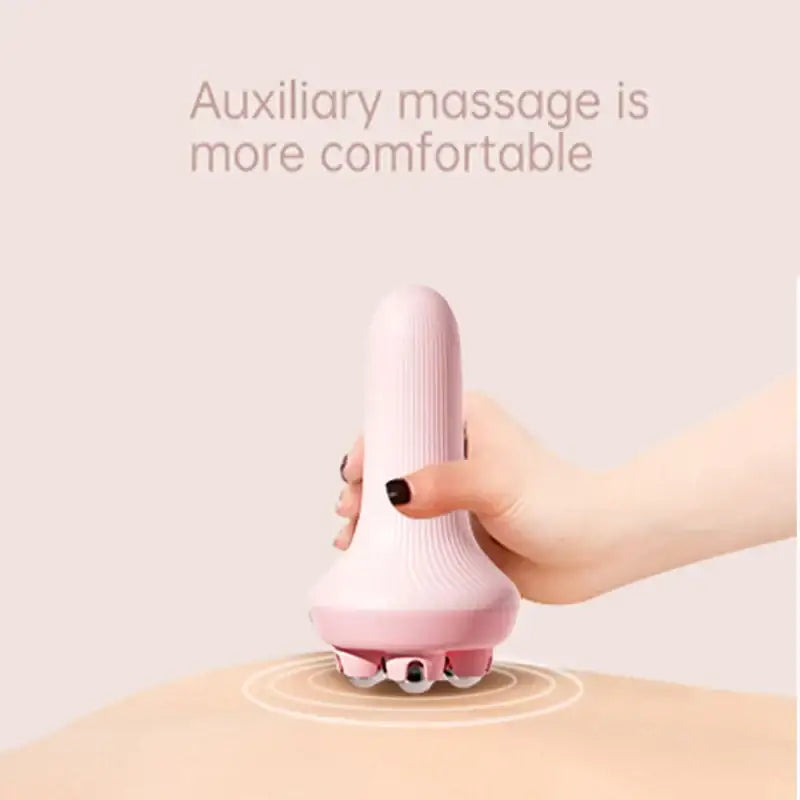 Pink handheld massage device with a rounded top and textured base.