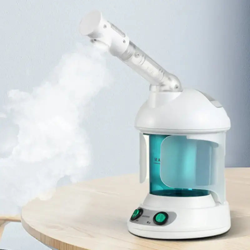 Facial steamer emitting a cloud of warm mist.