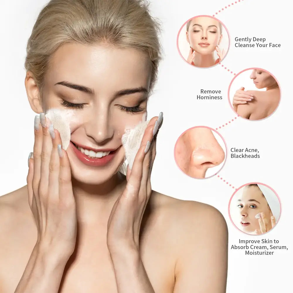 Woman applying facial cleanser with a smiling expression.