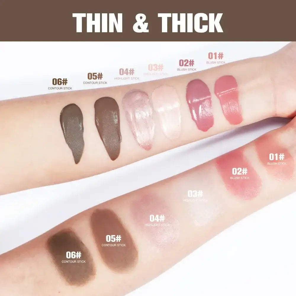 Swatches of makeup or cosmetic products in various shades and opacities on skin.