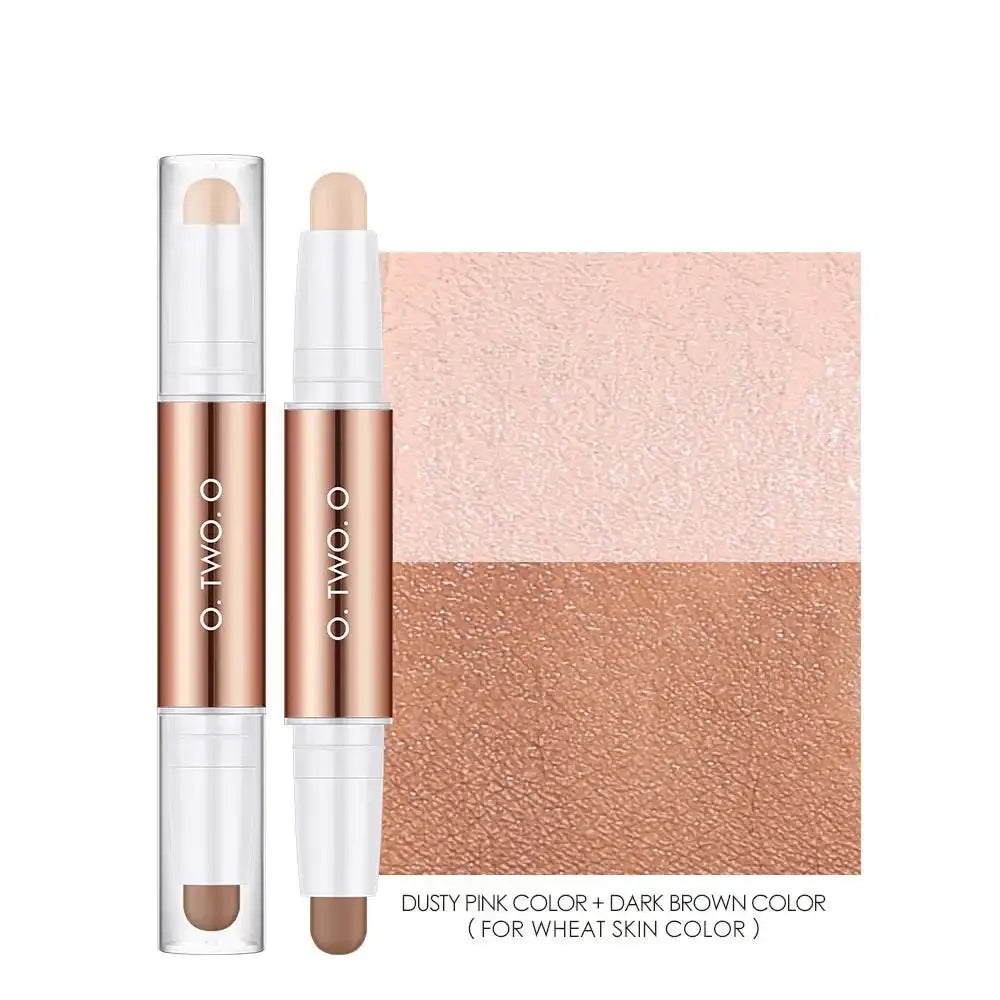 Dual-ended makeup stick with rose gold metallic tubes and cream-colored product tips.