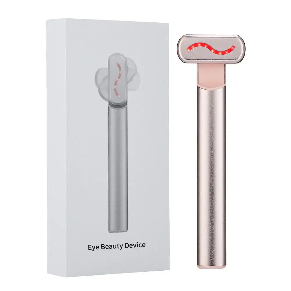 Eye beauty device with a metallic handle and oval-shaped head containing red lights.